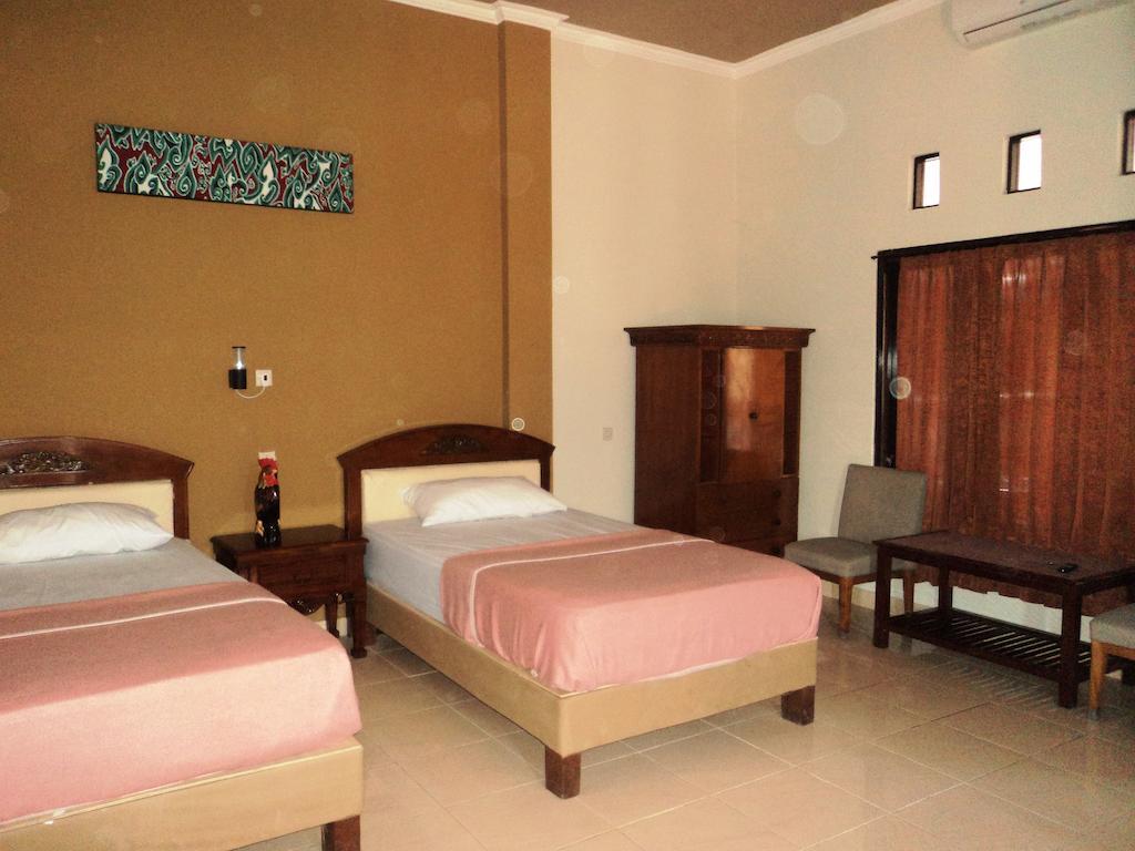 Hotel Sentral Pabean Buleleng Стая снимка
